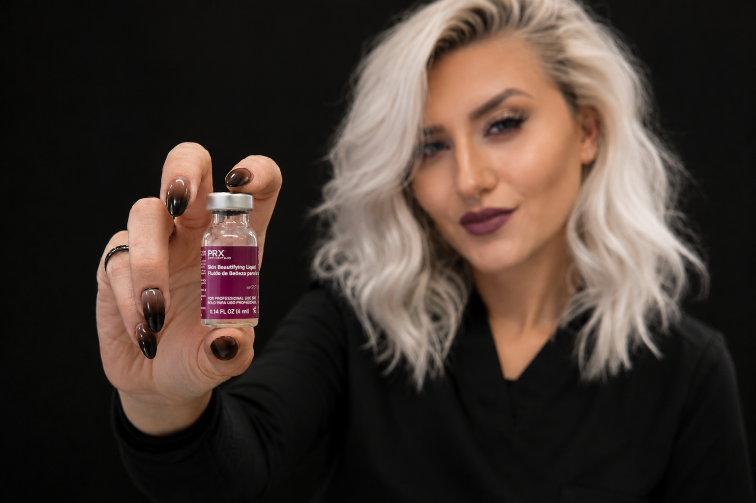 Alyssa Hoover performing a PRX topical biostimulator treatment at FRZN Aesthetics in Frisco, Texas